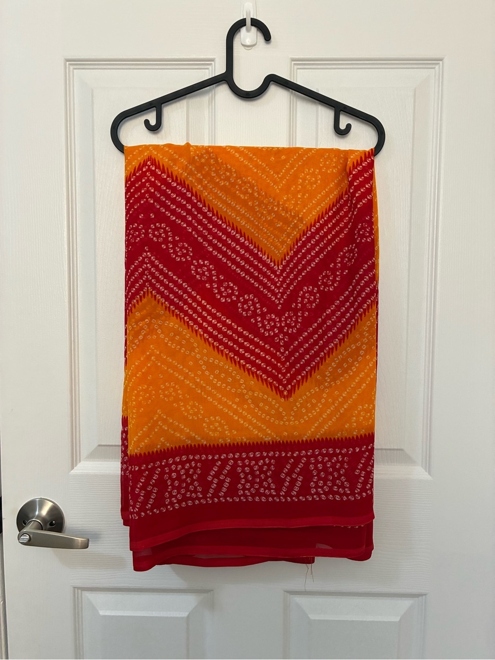 Vibrant Red and Orange Patterned Saree